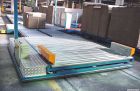 CARRELLO TRASLATORE CON CULLA CON MOVIMENTO PERPENDICOLARE AI BINARI PER L’INSERIMENTO DELLA BOBINA VERSO LA TESTATA SVOLGITORE/AVVOLGITORE